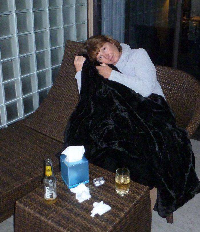 Attached picture Judy snuggled up on the balcony.jpg
